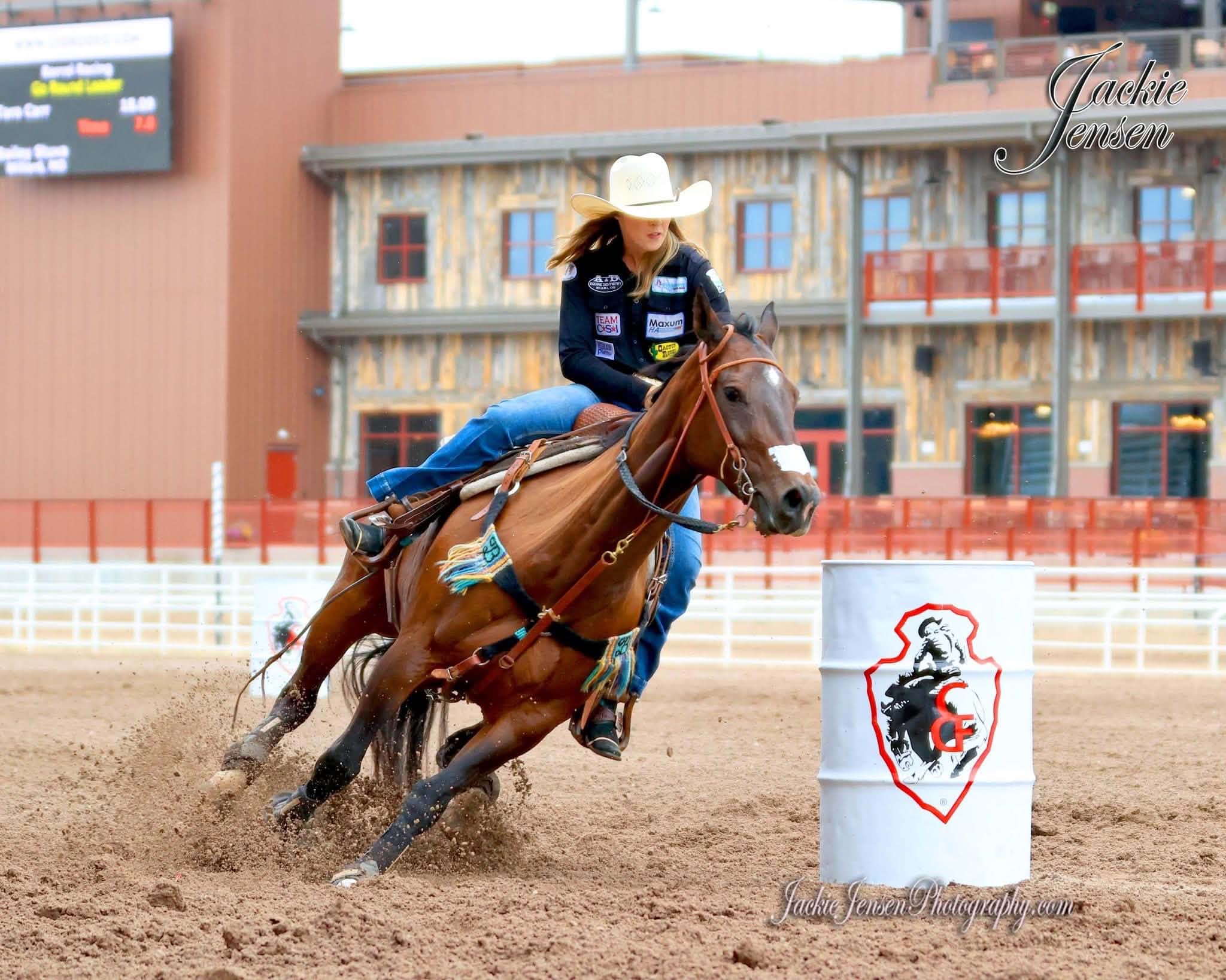 Bailey Stuva-Orman rounding a barrel at a major rodeo